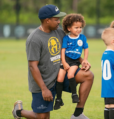 Parents and players at a HappyFeet league